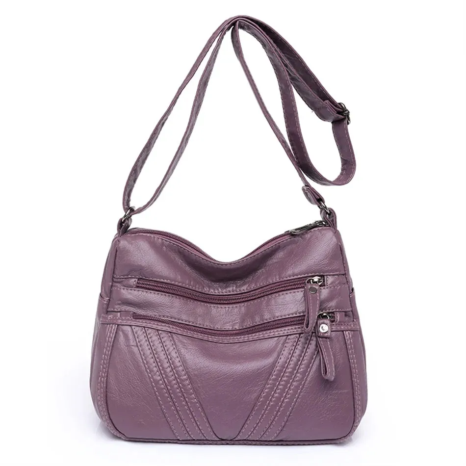 Zipped Leather Sling Bag with Multiple Compartments