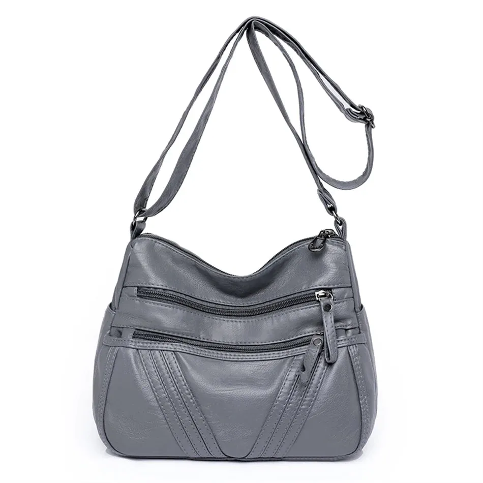 Zipped Leather Sling Bag with Multiple Compartments