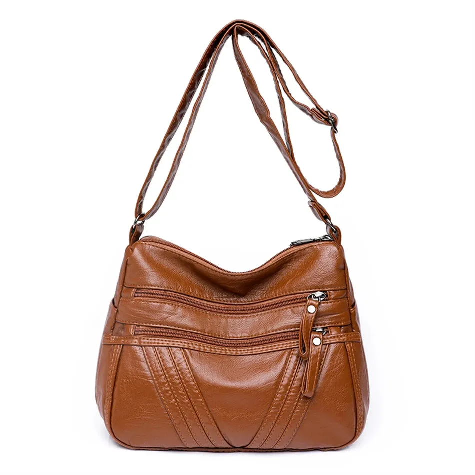 Zipped Leather Sling Bag with Multiple Compartments