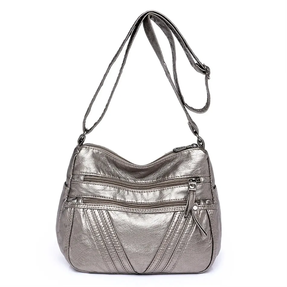 Zipped Leather Sling Bag with Multiple Compartments