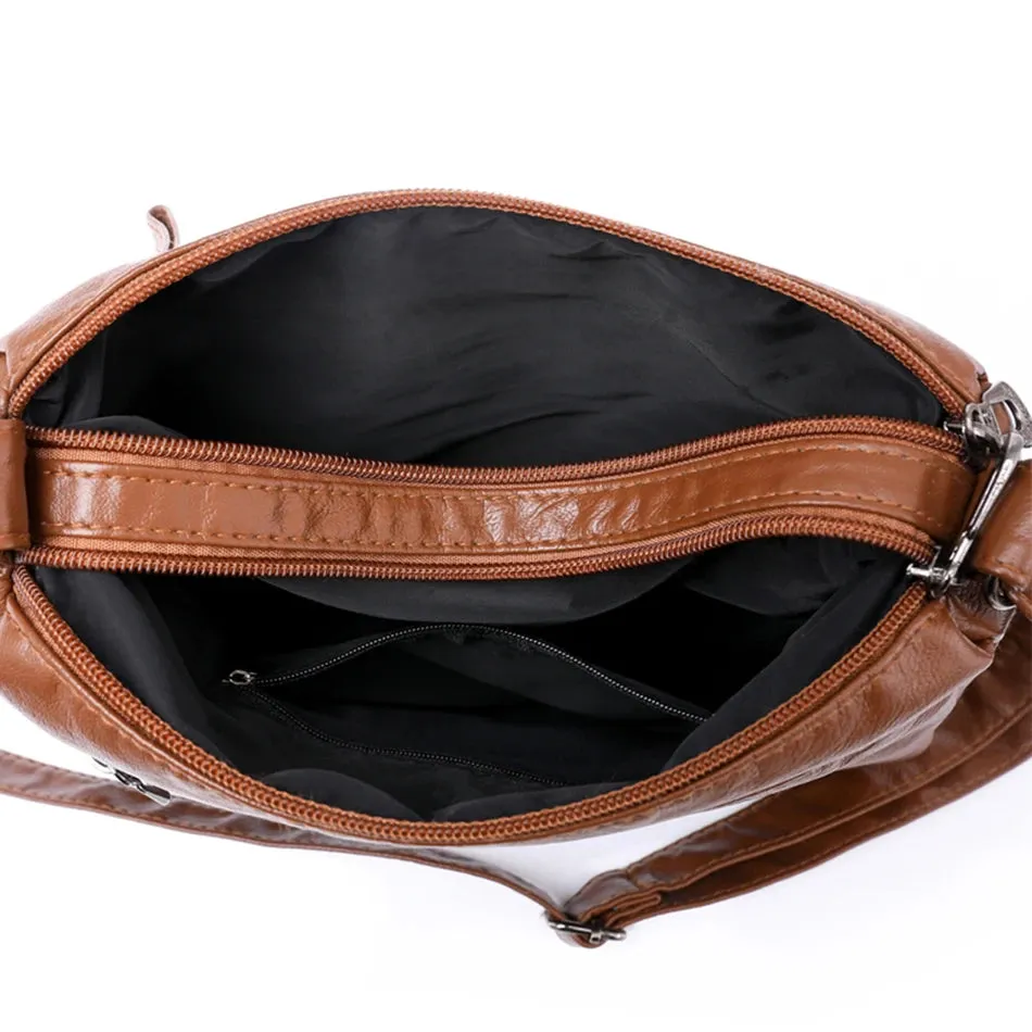 Zipped Leather Sling Bag with Multiple Compartments