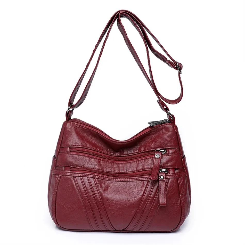 Zipped Leather Sling Bag with Multiple Compartments